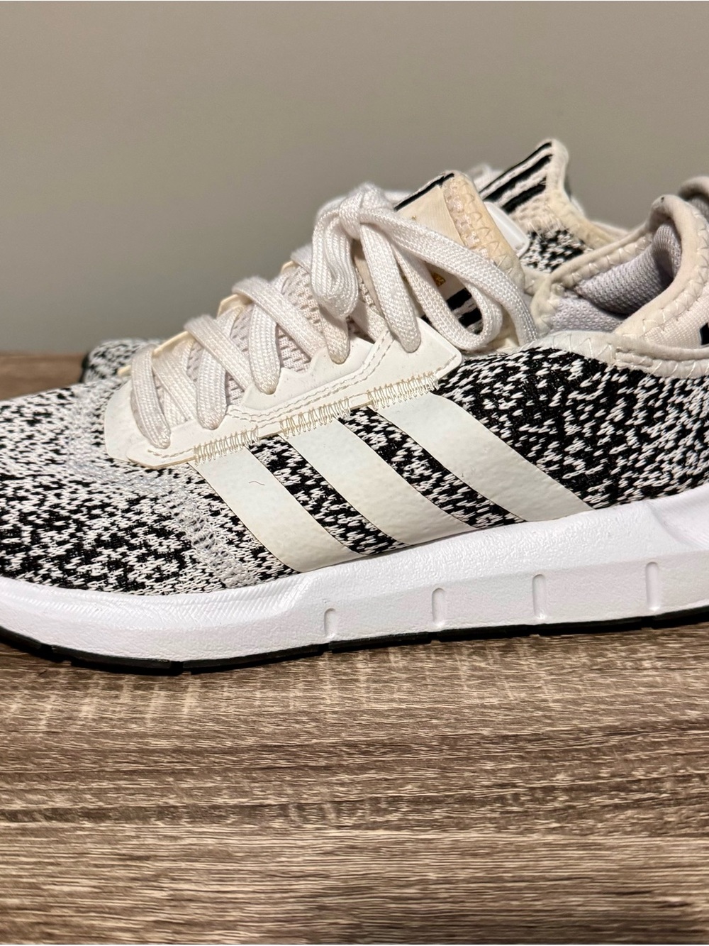 Adidas women’s white and Black Knit Sneaker